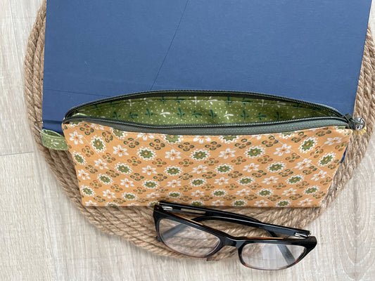 “Green and gold floral eyewear case made with vintage‑inspired Lori Holt Calico Days fabric, with zipper, tassel, and clip.”