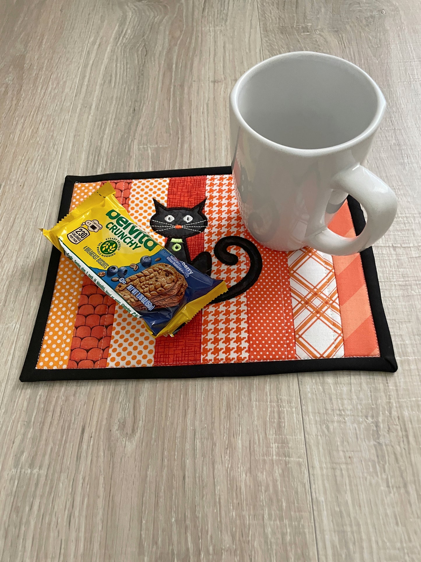 Cat Lover Mug Rug: Handmade Quilted Orange Snack Mat with Black Cat