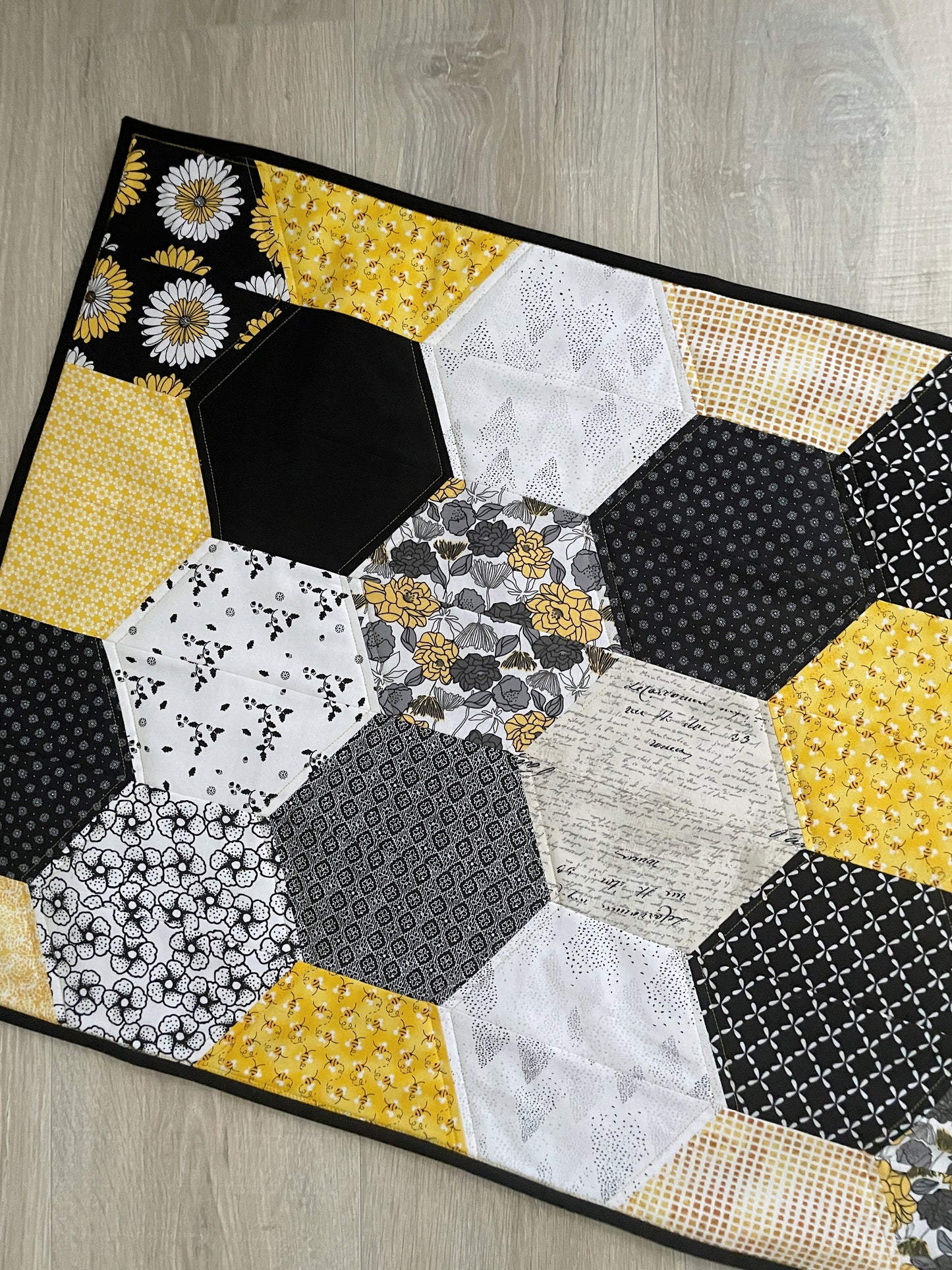 Handmade Modern Quilted Table Runner in Black, Yellow, and White Hexagons