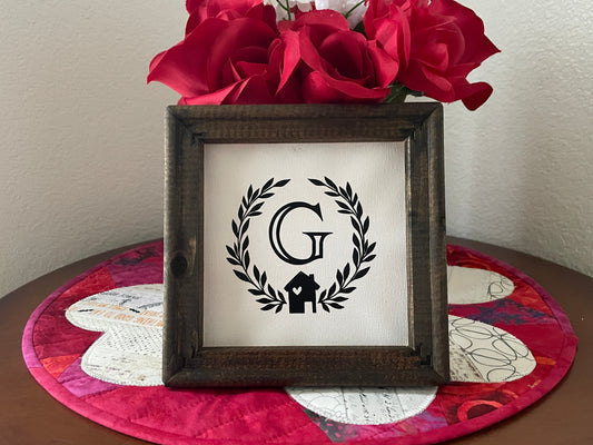 Rustic 6x6 wood framed family initial sign with canvas background and black farmhouse design.