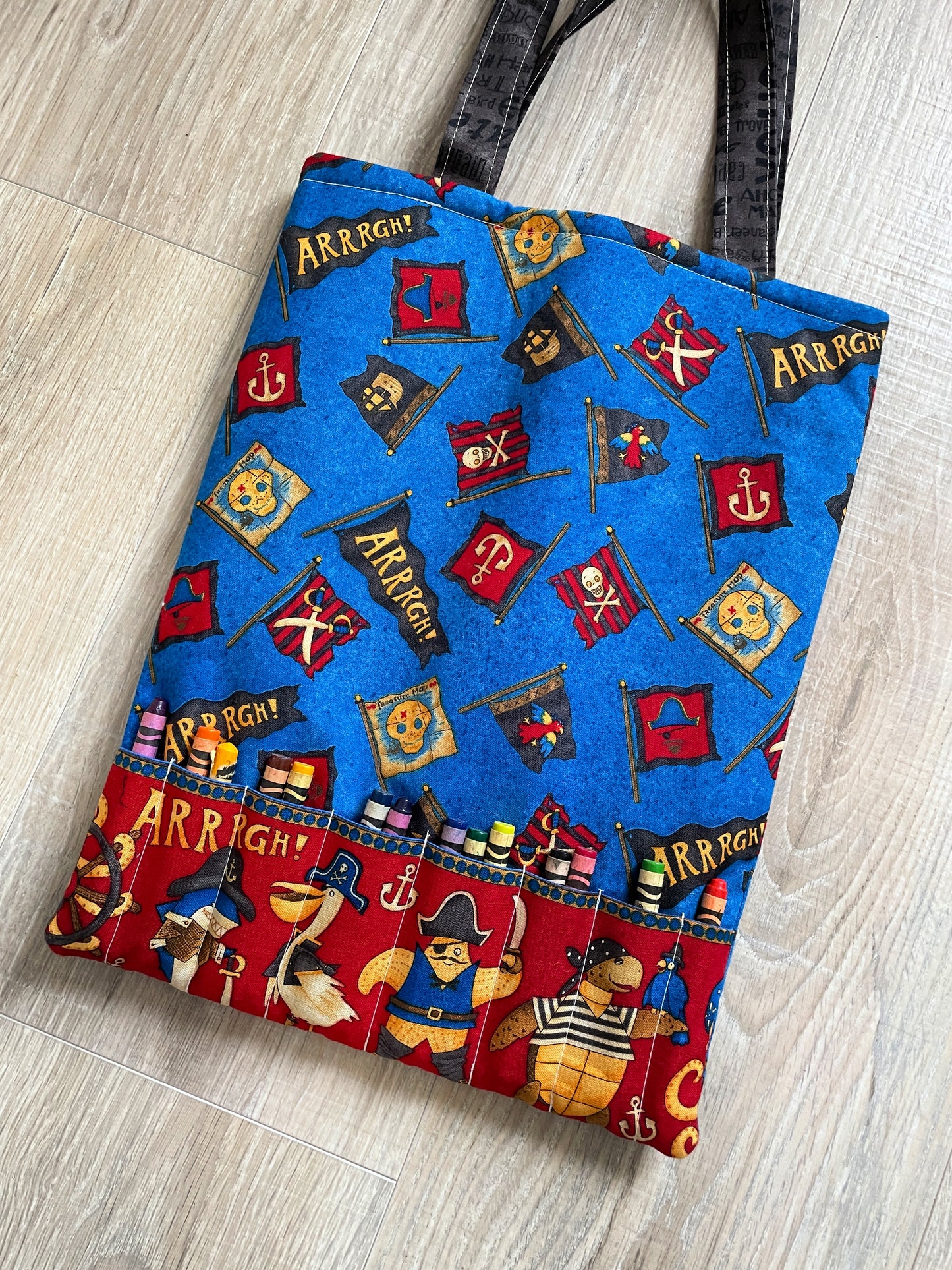 pirate themed toddler activity tote bag in red blue and yellow
