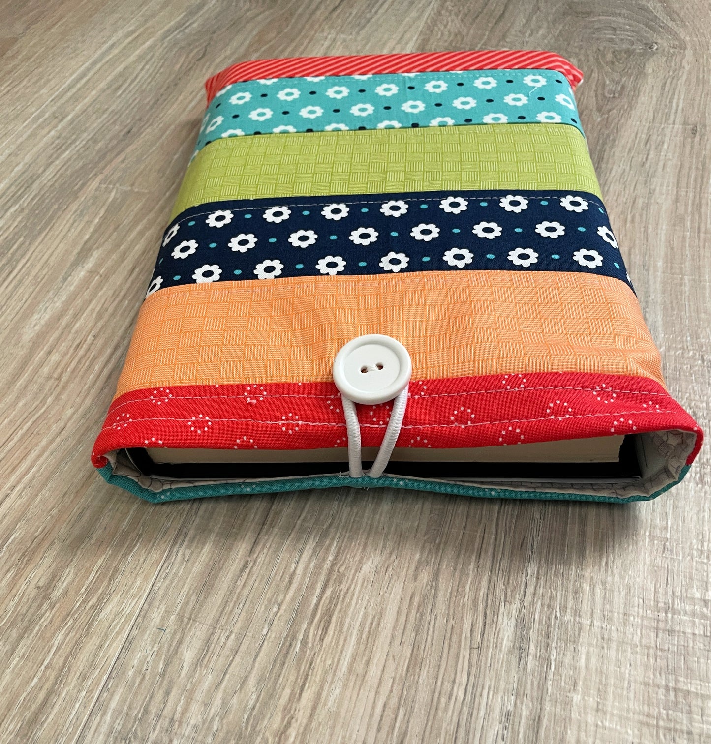 Handmade Quilted Book Cover, Vibrant Patchwork Sleeve with Button Closure, Reading Gift