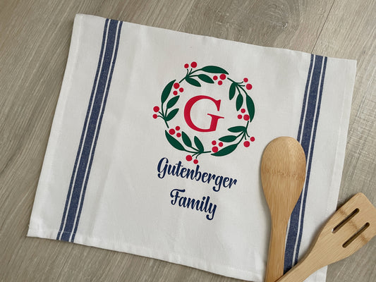 White cotton kitchen towel with Blue vintage stripes and personalized holiday family name wreath design.