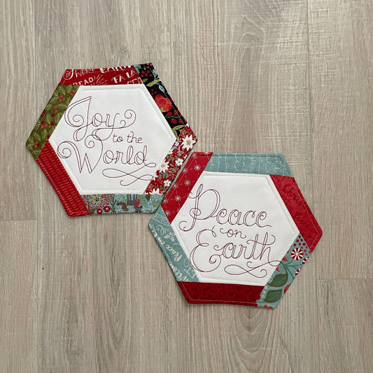 Christmas hexagon shaped mug rugs with embroidery joy to the world and peace on earth