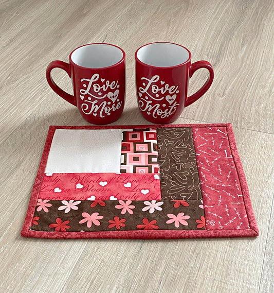 quilted mug rug using red pink and brown retro fabrics