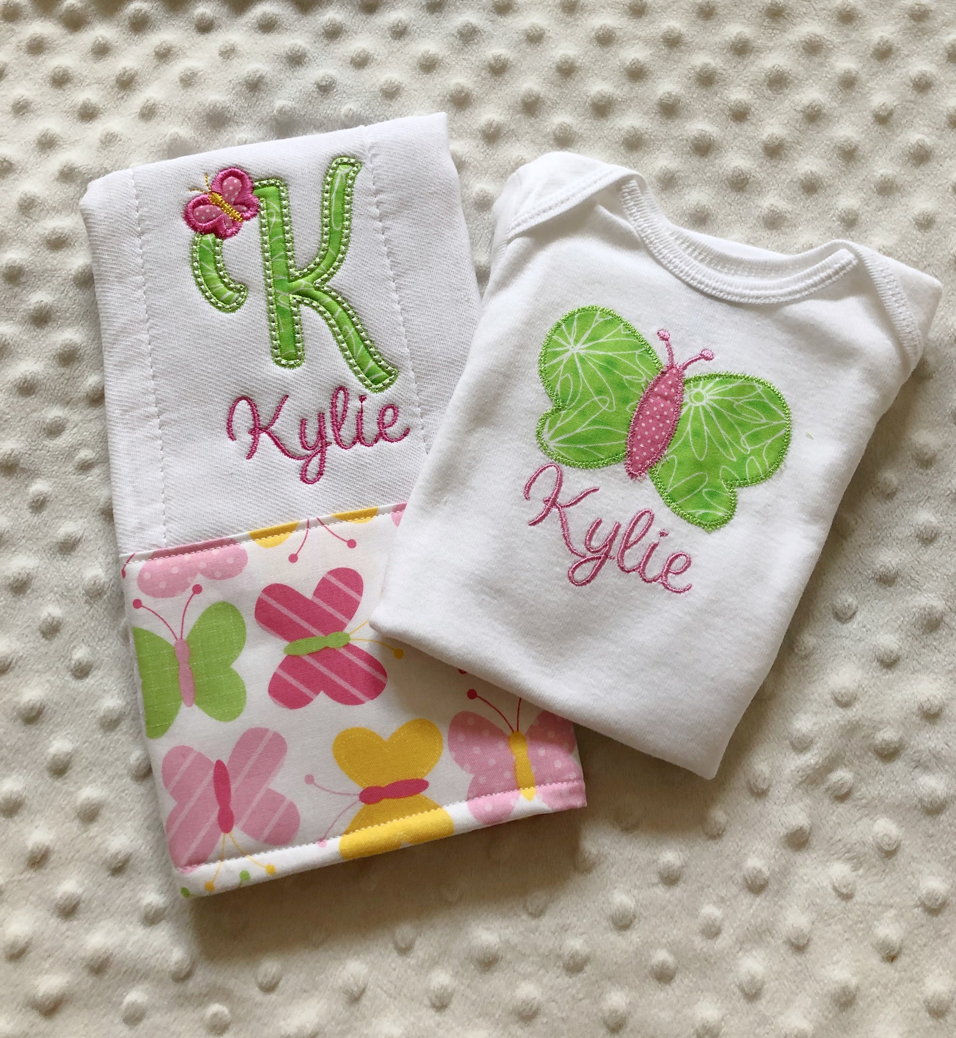 baby girl personalized bodysuit and burp cloth gift set with a butterfly theme