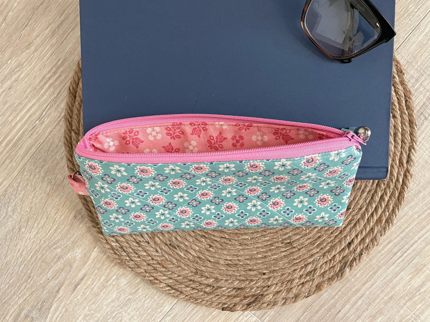 “Aqua and pink floral eyewear case made with vintage‑inspired Lori Holt Calico Days fabric.”