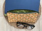 “Green and gold floral eyewear case made with vintage‑inspired Lori Holt Calico Days fabric, with zipper, tassel, and clip.”