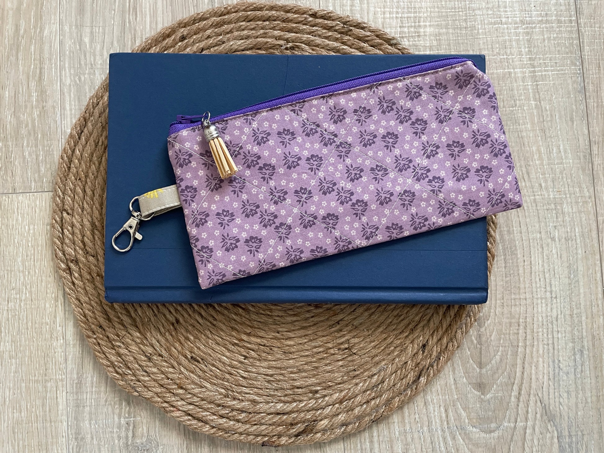 Purple ditzy floral eyewear case made with vintage‑inspired Lori Holt Calico Days fabric.”