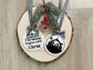 “Two acrylic Christian Christmas ornaments with gingham ribbon bows featuring ‘Christmas Begins with Christ’ and a nativity manger scene.”