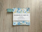Blue floral handmade fabric jar gripper set of three with non-slip backing and ribbon loops for opening stubborn jar lids