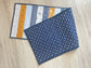 Quilted table runner with floral and bee prints in blues and golds