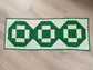 St. Patrick Day Quilted Table Runner, Green and White Modern Cross Patchwork,