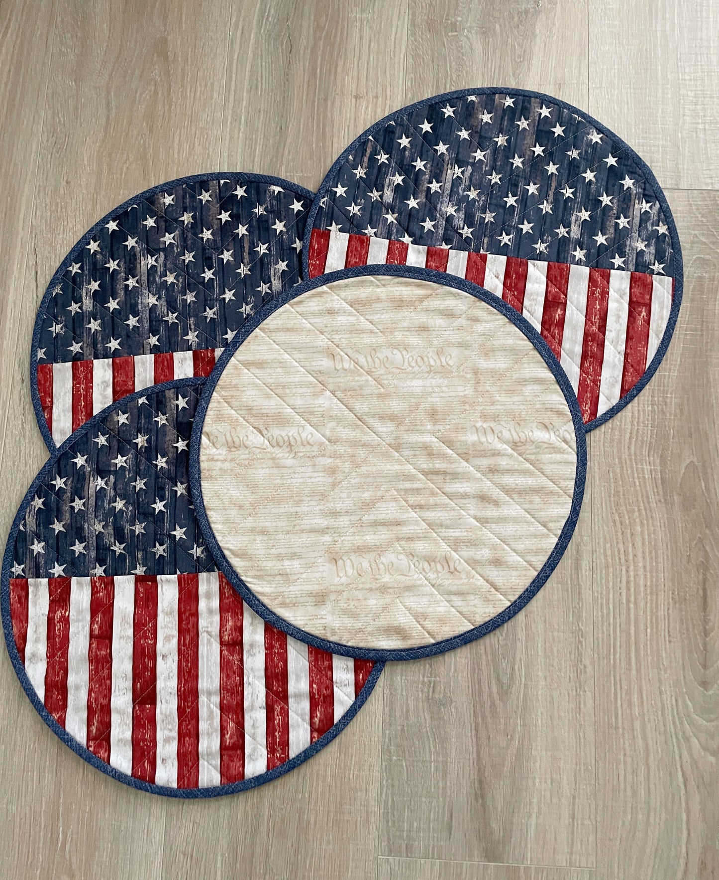 Time to celebrate America! Create a lovely table using these beautiful red, white, and blue round set of 4 rustic flag placemats, measuring 15 inches in diameter.