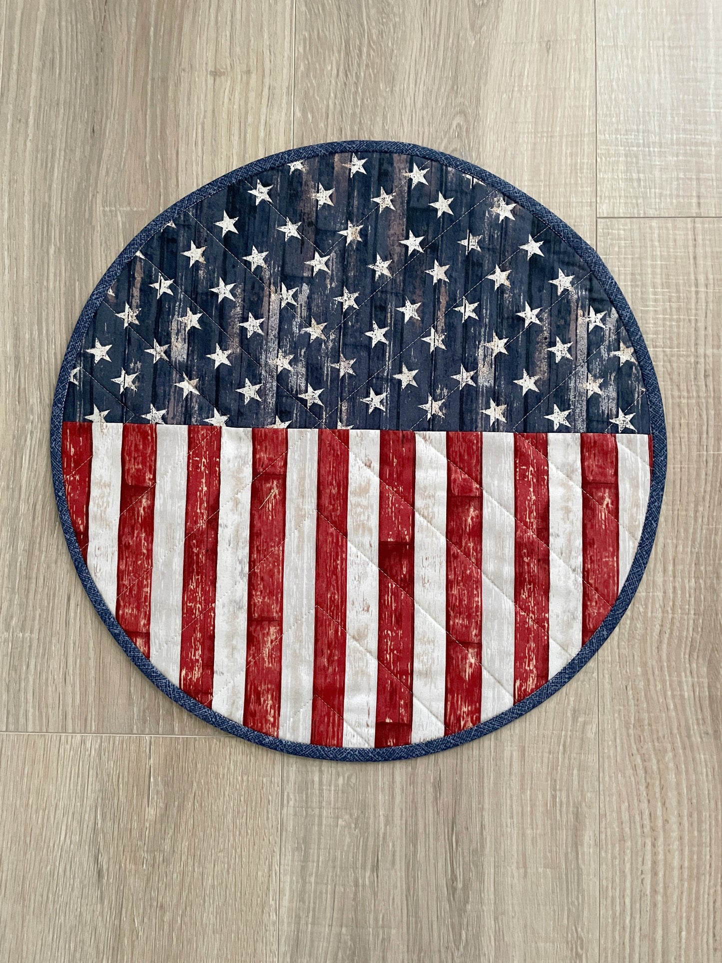 Time to celebrate America! Create a lovely table using these beautiful red, white, and blue round set of 4 rustic flag placemats, measuring 15 inches in diameter.