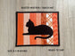 Quilted orange mug rug with black cat appliqué, handmade 8x10 snack mat.
