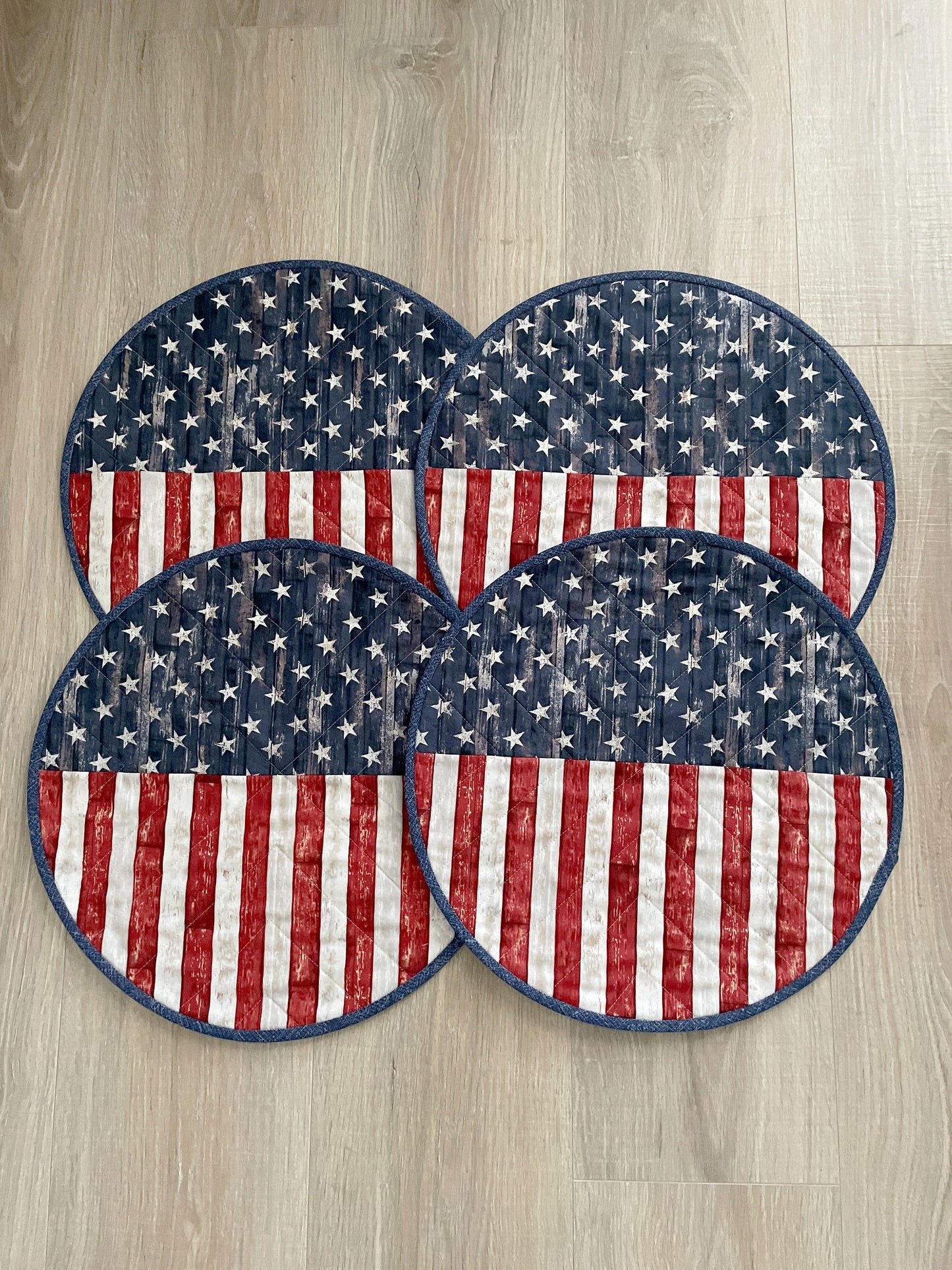 Time to celebrate America! Create a lovely table using these beautiful red, white, and blue round set of 4 rustic flag placemats, measuring 15 inches in diameter.