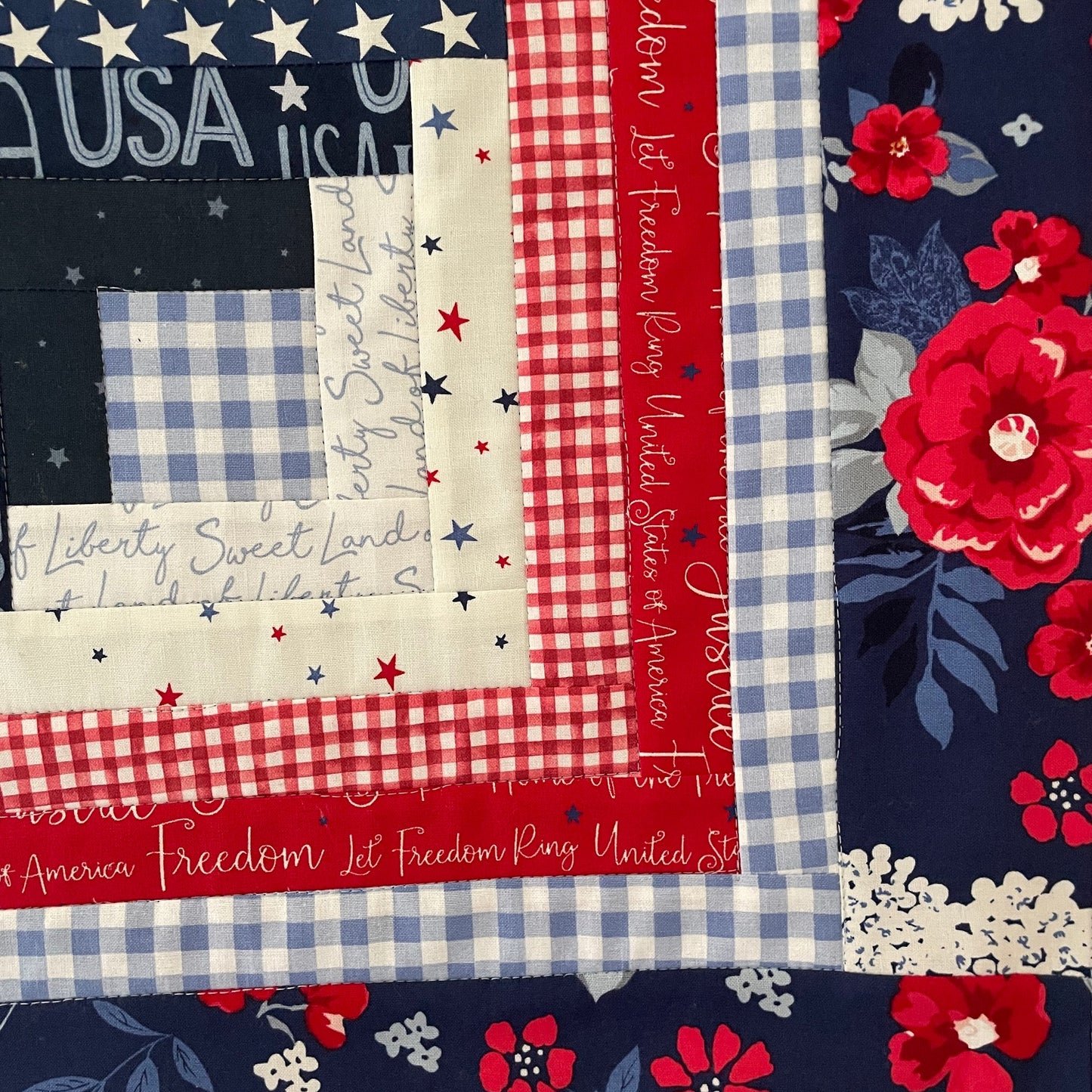 Quilted Table Topper, Red White Blue Log Cabin