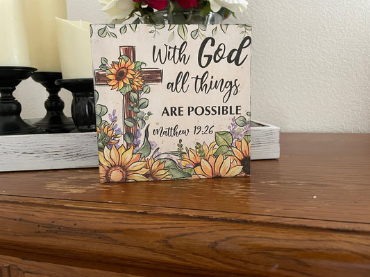 6x6 wooden shelf sitter with a sunflower cross and the verse “With God all things are possible.”