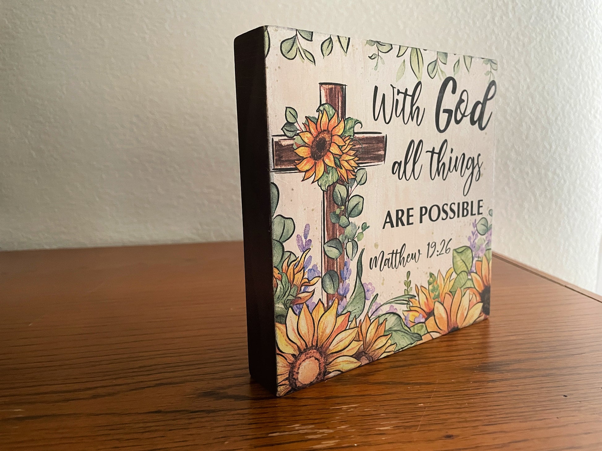 6x6 wooden shelf sitter with a sunflower cross and the verse “With God all things are possible.”